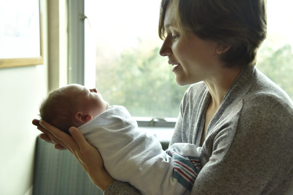 Mother holding infant